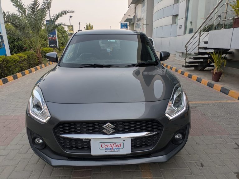 Listed Suzuki Swift GLX in Graphite grey